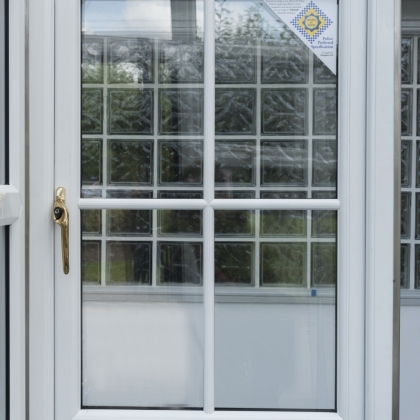 Casement window with bars in a showroom