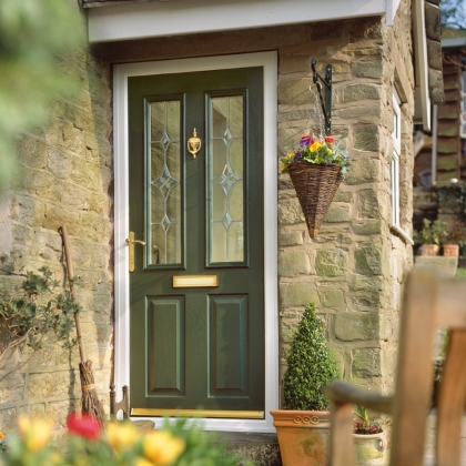 Olive Composite door with hanging flower basket